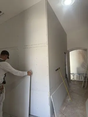 New drywall sheets hung on an interior wall